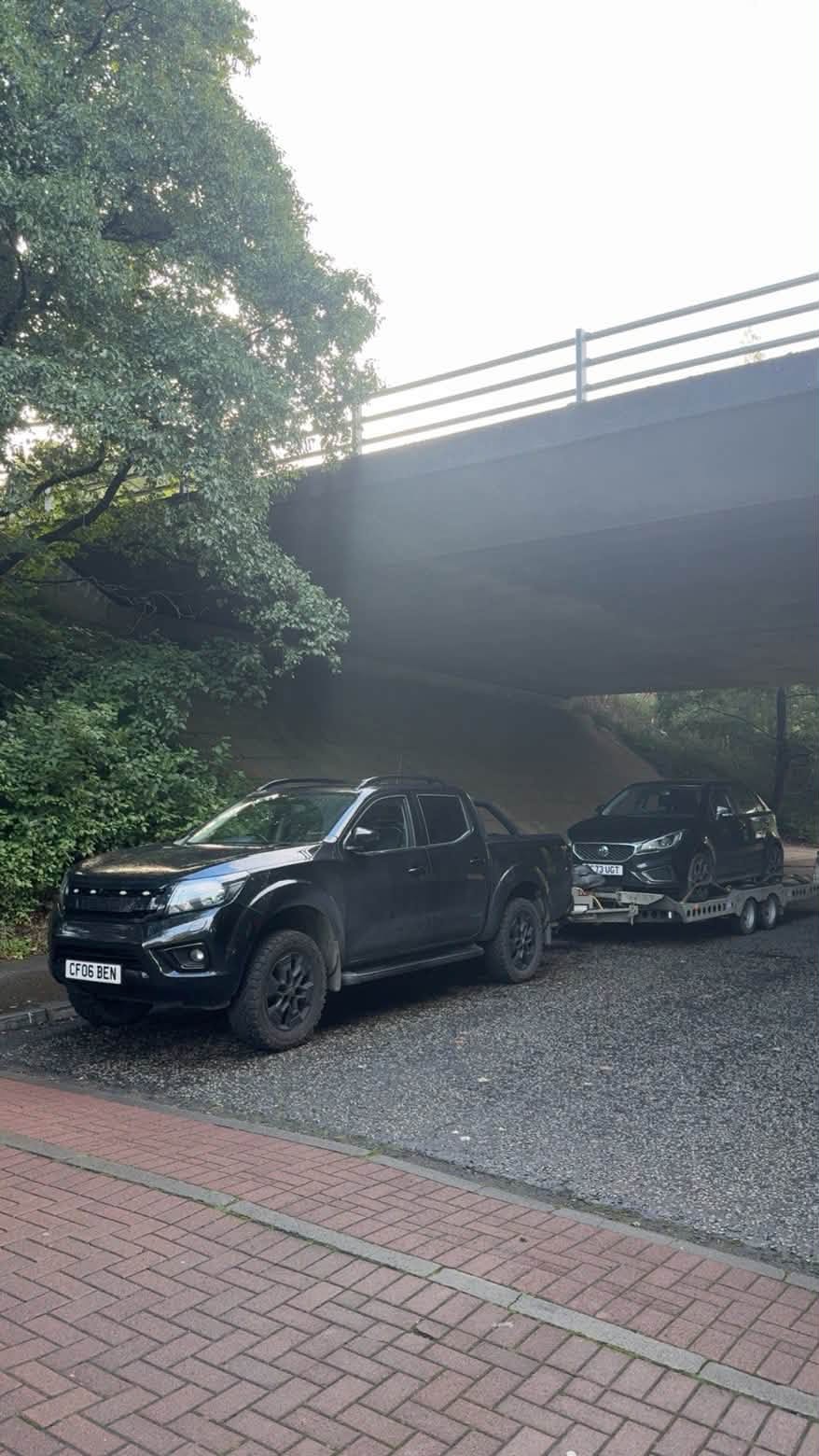 Connor Waldron recovery vehicle transporting a non-running car